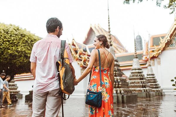 Couple in Wat Pho during rainy season